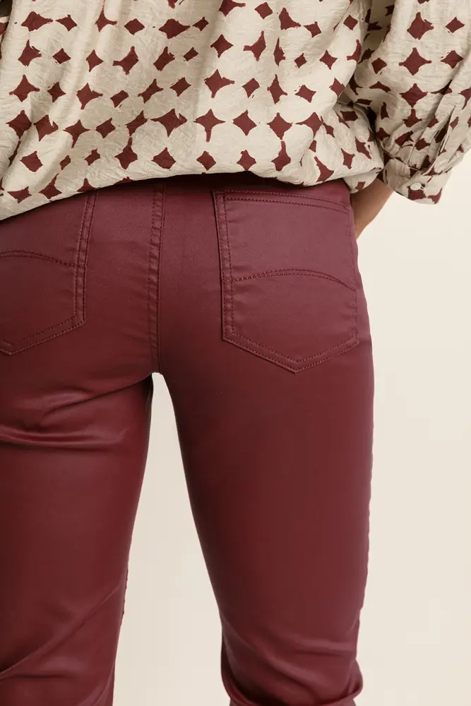 Coated skinny jeans