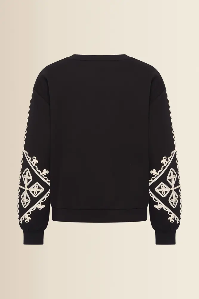 Sweater met contrasterende borduusels
