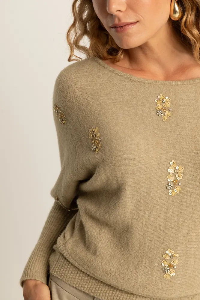 Trui met geborduurde details