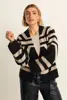 Jacquard vest met ceintuur