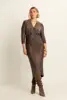 Glitterjurk met V-hals