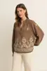 Geborduurde blouse