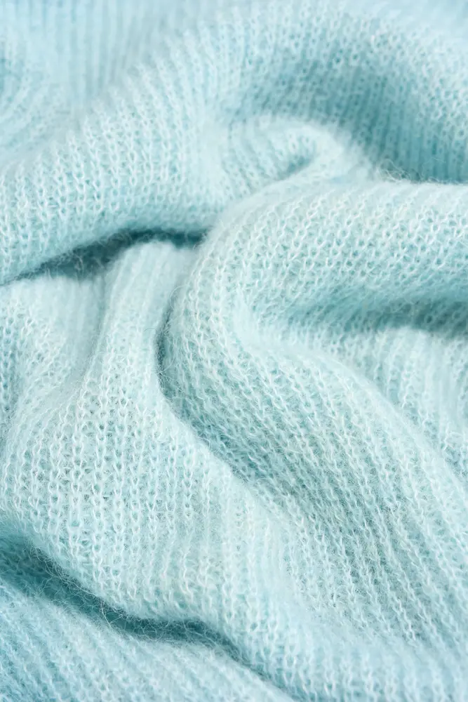 Trui met strikdetail
