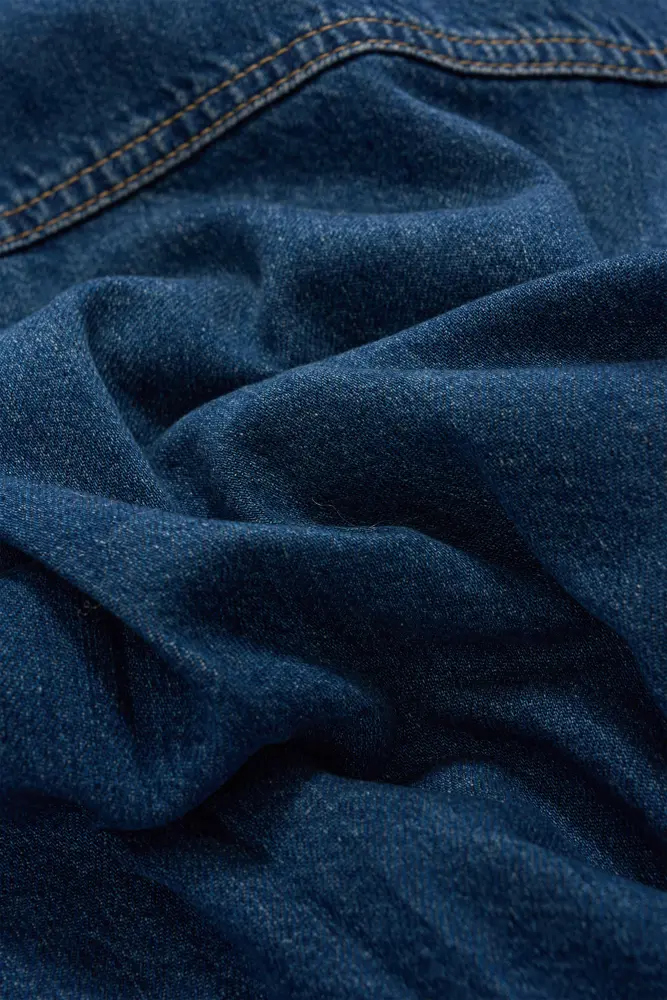 Denim jasje met contrasterende stiksels
