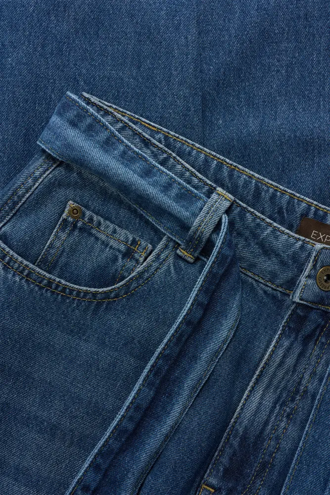 Jeans met strikceintuur
