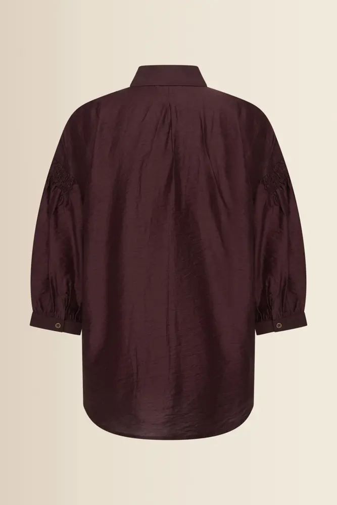 Blouse met goudkleurige borduursels