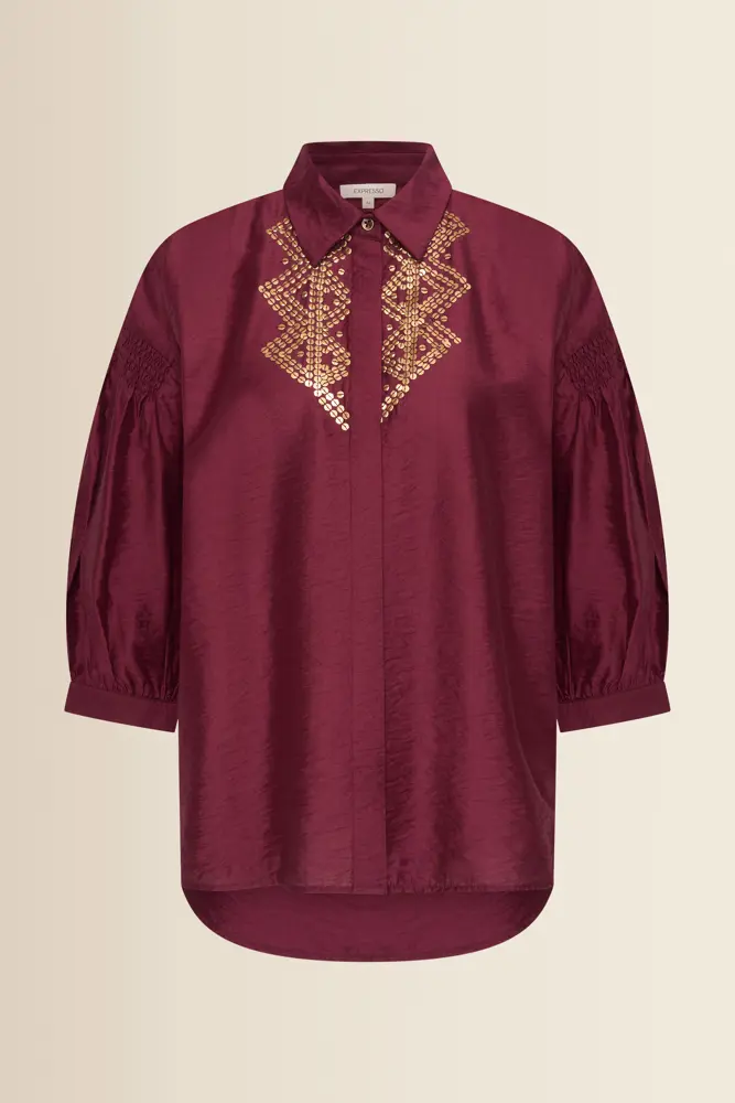Blouse met goudkleurige borduursels