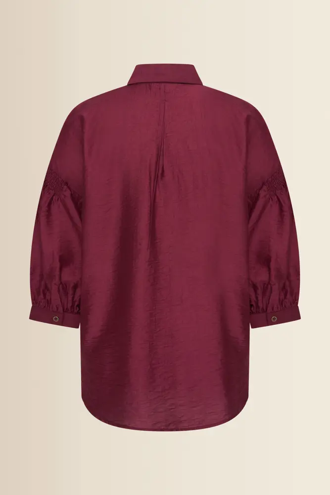 Blouse met goudkleurige borduursels