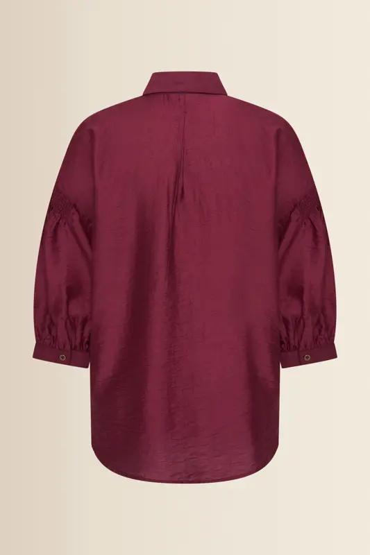 Blouse met goudkleurige borduursels